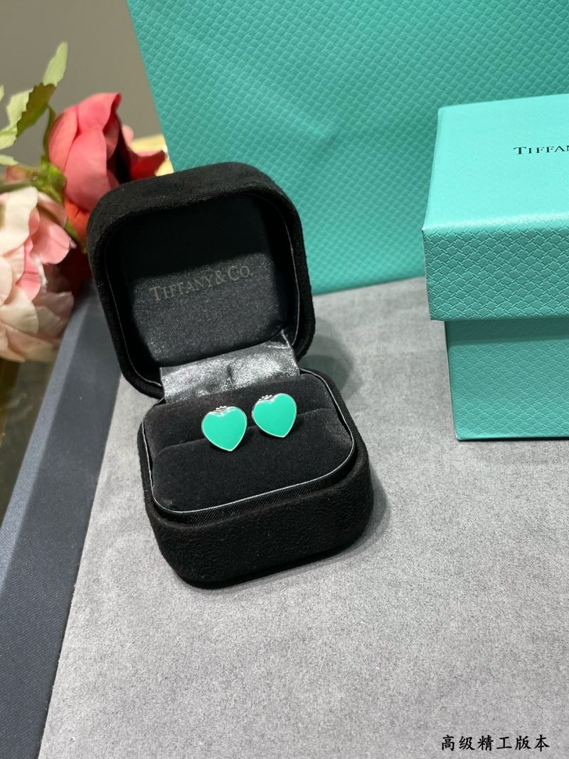 T*f*ny earrings